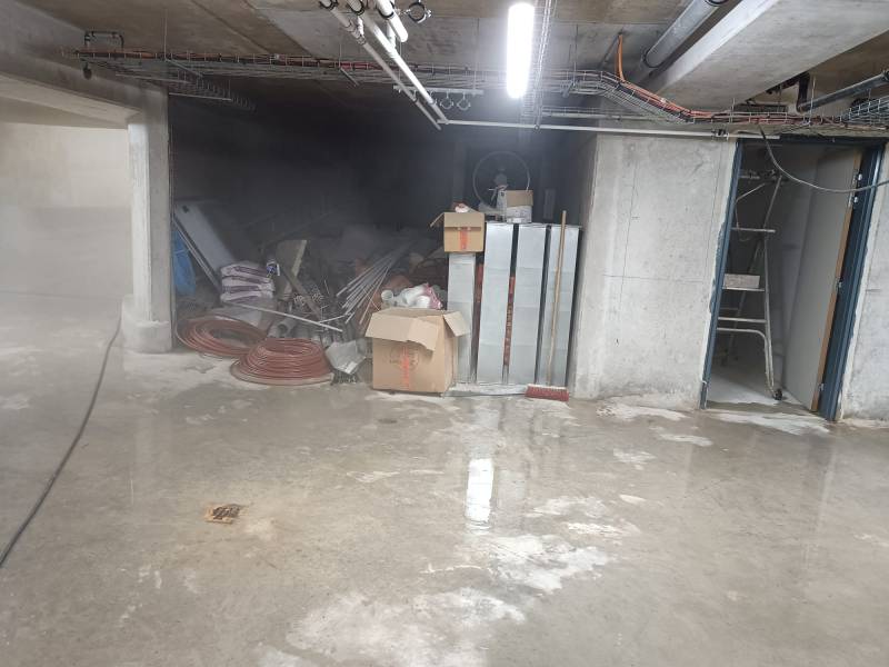 Intervention pour nettoyer et remettre en état un parking en sous-sol après travaux à Paris dans le 9ème 